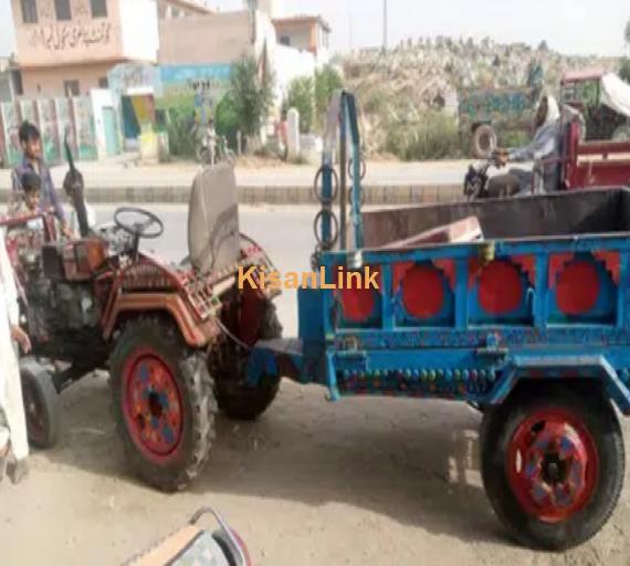 Small tractor and trolley dunpung